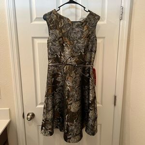 NWT textured/patterned A-line dress with belt. Unique dip in neckline.
